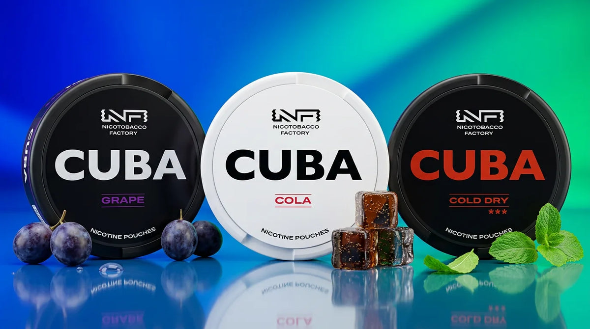 Three CUBA nicotine pouch tins in black Grape, white Cola and black Cold Dry beside grapes, cola ice cubes and a mint leaf - CUBA nicotine pouches review.